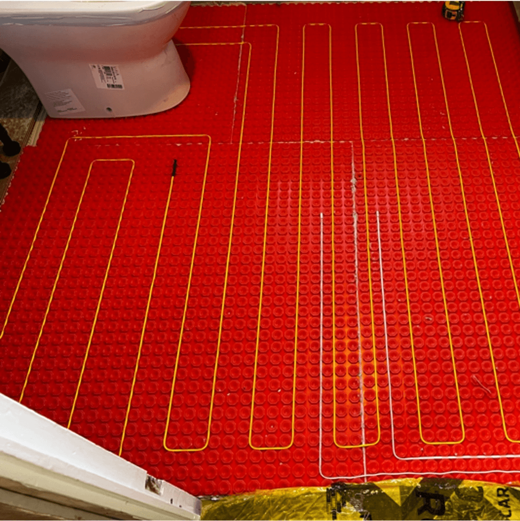 A loose lay system installed in a bathroom